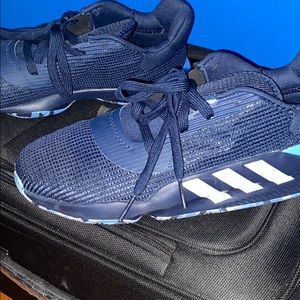 Blue adidas basketball shoes
